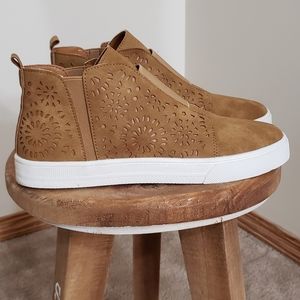 Outwoods brand ankle high slip on shoe.